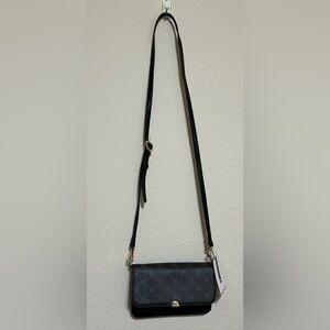 Nine West Black Purse. Please see picture 5 to see a little piece off of purse.